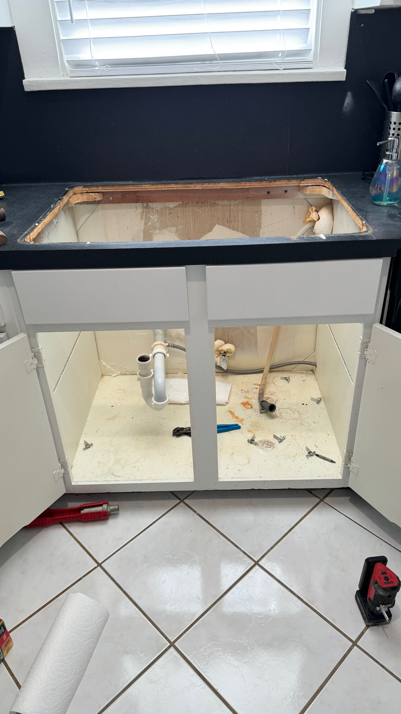 Sink or faucet fixture before repair or replacement