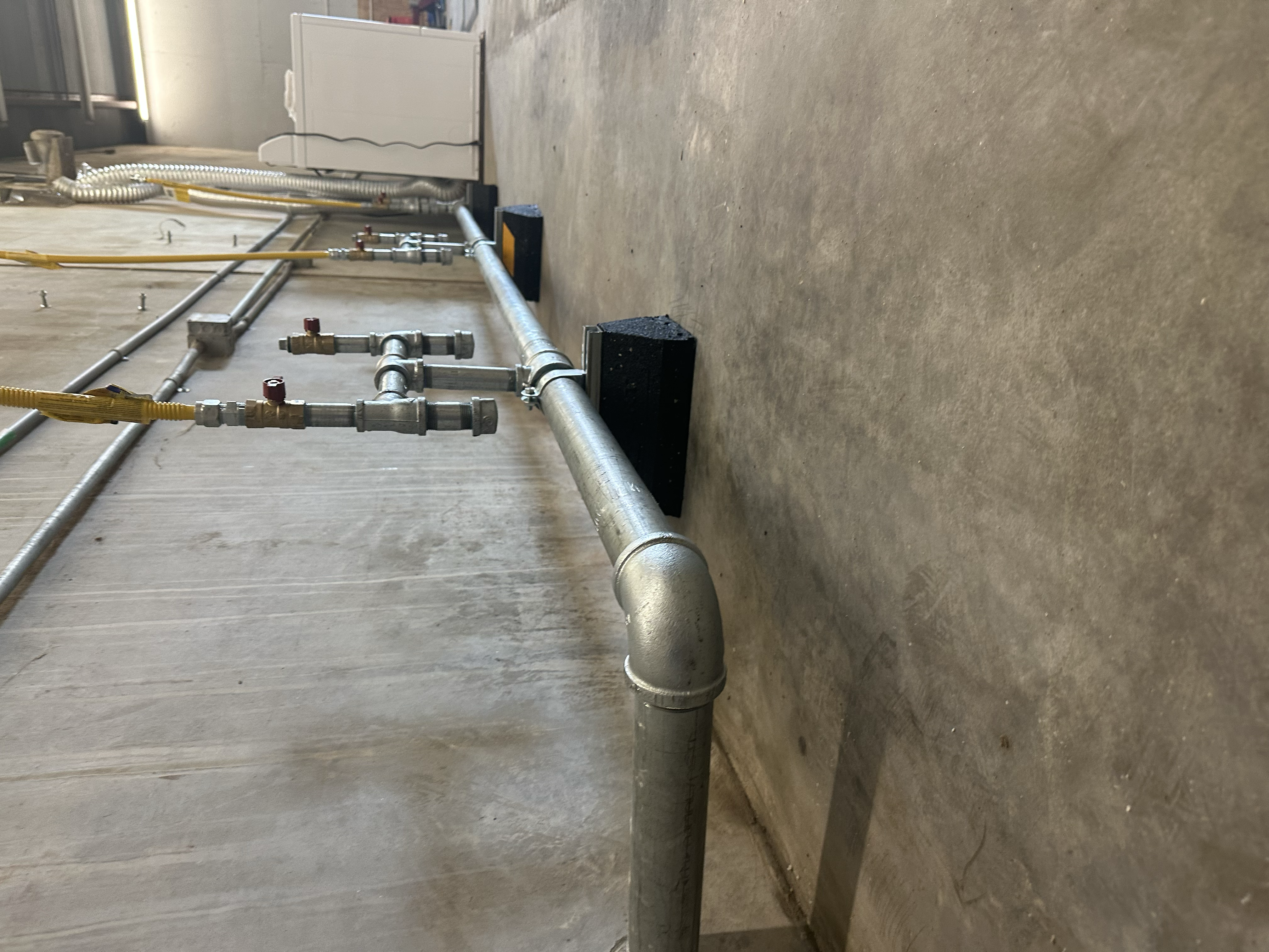Completed gas line connection after professional installation and testing